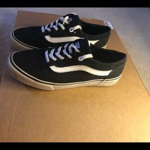 Low top black and white vans